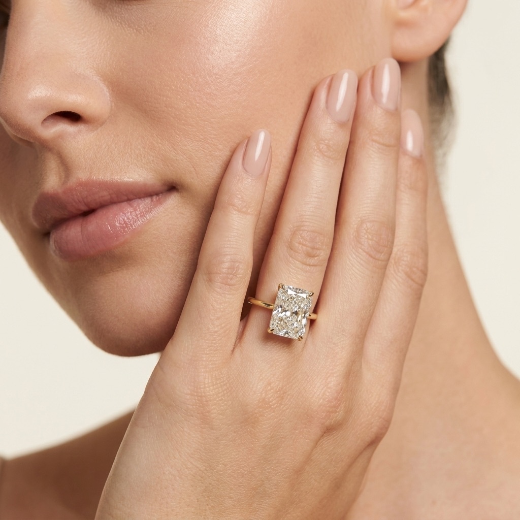 Radiant-cut diamond solitaire in yellow gold